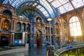 Antwerp, Belgium - June 2019: Interior of Antwerp Central Train station with sun shining through the glass windows