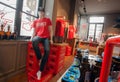 Dummy in red t-shirt inside souvenir and beer store of historical brewery with trademark De Koninck Royalty Free Stock Photo