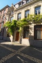 A picturesque pedestrian street with traditional Flemish architecture. Historical part of Antwerp. Royalty Free Stock Photo