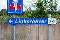 Antwerp, Belgium - Sign of the cycling path towards the left banks , called Linkeroever Royalty Free Stock Photo