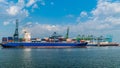 Antwerp, Belgium, view of harbor cranes and container ships in the largest dock of the port Antwerp Royalty Free Stock Photo