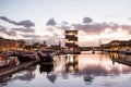 Antwerp, Belgium, beautiful night view of modern Eilandje area and port. Small island district and sailing marine at sunset. Popul