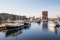 Antwerpen, Belgium, beautiful view of modern Eilandje area and port. Small island district and sailing marine at sunset.