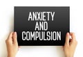Anxiety and Compulsion text concept on card for presentations and reports