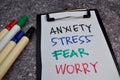 Anxiety, Stress, Fear, Worry write on sticky notes isolated on Office Desk Royalty Free Stock Photo