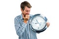 Anxious late man holding a clock Royalty Free Stock Photo