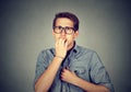 Anxious man biting fingernails nervously Royalty Free Stock Photo