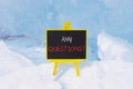 Any questions symbol. Concept words Any questions on beautiful yellow blackboard. Beautiful forest snow blue sky background. Royalty Free Stock Photo