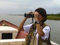 Birders in the outdoors birdwatching during Global Shorebird Counting Program