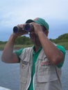 Birders in the outdoors birdwatching during Global Shorebird Counting Program