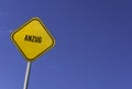 Anzug - yellow sign with blue sky background
