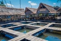 AO NANG, THAILAND - FEBRUARY 19, 2018: Outdoor view of traditional Thai seafood restaurant on stilts over the water in