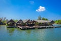 AO NANG, THAILAND - FEBRUARY 19, 2018: Outdoor view of traditional Thai seafood restaurant on stilts over the water in