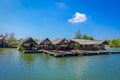 AO NANG, THAILAND - FEBRUARY 19, 2018: Outdoor view of traditional Thai seafood restaurant on stilts over the water in