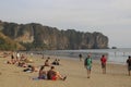 AO NANG, THAILAND, FEBRUARY 10, 2015 : Tourists enjoying the beautiful and wide Railay West beach surrounded by awesome cliffs in Royalty Free Stock Photo