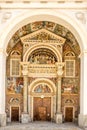 View at the Portal of Cathedral of San Giovanni Battista and Santa Maria Assunta in Aosta - Italy Royalty Free Stock Photo