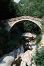 Aosta Valley, Italy - The ancient Roman bridge over the river in the little village named  Pontboset Royalty Free Stock Photo