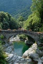 Aosta Valley, Italy - The ancient Roman bridge over the river in the little village named  Pontboset Royalty Free Stock Photo