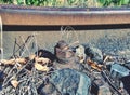 Rusty train railway detail, oiled sleepers and stones between rail way Royalty Free Stock Photo