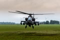 An Apache helicopter flies away from Flevoland