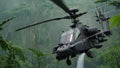 Apache helicopter flying between the green trees in the jungle Royalty Free Stock Photo