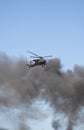 Apache helicopter in a warzone