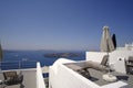 Apartment balcony in a white luxurious resort with great views of the Santorini Island shore