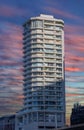 Apartment block in Sydney NSW Australia at sunset vivid multi colours