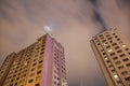 Apartment blocks from below with long exposure at night Royalty Free Stock Photo