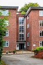 Apartment building brick built in the 1970\'s flat roof style homes