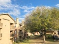 Typical apartment complex with steep grassy backyard in North Texas, America