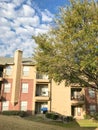 Typical apartment complex with steep grassy backyard in North Texas, America