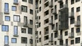 Exterior of a high-rise apartment building facade, windows and balconies. Royalty Free Stock Photo