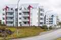 Apartment building in a housing development along a street