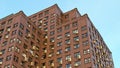 Apartment building red brick corner windows with air conditioning condominium old architecture 3D illustration