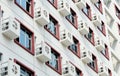 Apartment building wall with large group of air-conditioners Royalty Free Stock Photo