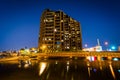 Apartment building on the waterfront at night, in Canton, Baltimore, Maryland. Royalty Free Stock Photo