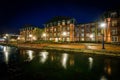 Apartment buildings along Carroll Creek at night, in Frederick, Royalty Free Stock Photo