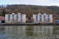 Apartment buildings bank Meuse, Leffe, Dinant, Belgium