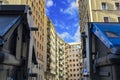 Apartment buildings in the big city. View from below. blue sky, high-rise house Royalty Free Stock Photo