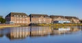 Apartment buildings at the Geeste river in Bremerhaven Royalty Free Stock Photo