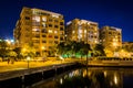 Apartment buildings at night on the waterfront in Fells Point, B