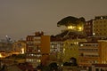 Apartment buildings and viewpoint of our Lady of the hill at night Royalty Free Stock Photo