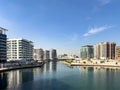 Apartment buildings and water canal in the Al Raha Beach neighbourhood in Abu Dhabi