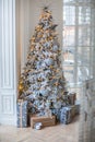 The apartment is decorated with a Christmas tree Royalty Free Stock Photo