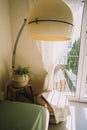 Apartment decorated with a vintage lamp with an antique hairdressing dryer design