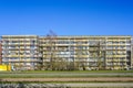 Apartment house facade renovation and thermal insulation, scaffolding