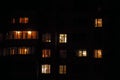 Apartment house windows at night