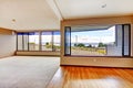 Apartment living room with large windows.