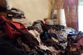 Apartment of a pensioner who suffers from compulsive hoarding, littered with trash and books